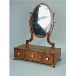 A George III mahogany oval toilet mirror