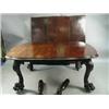 Image 1 : A good Victorian mahogany extending dining table with 3 leaves and serpentine ends on boldly carved 