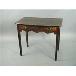 A 19th century mahogany bowfronted side table with a single frieze drawer