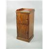 Image 1 : A 19th century mahogany two door pot cupboard raised on a plinth base
