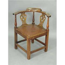 A George III masonic yew wood corner chair