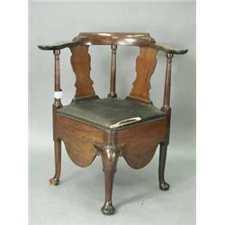 A George III mahogany corner commode chair