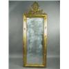 Image 1 : A 19th century gilt wall mirror with a carved crest