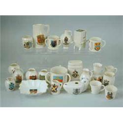 A collection of twenty two pieces of Goss crested china items