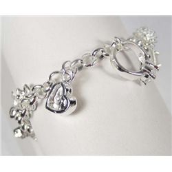 10815 - SILVER CHARM BRACELET MARKED .925