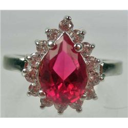 11198 - WHITE GOLD PLATED RUBY AND TOPAZ RING