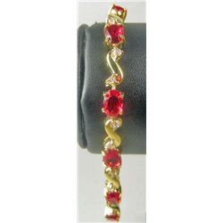 11180 - GOLD PLATED RUBY & TOPAZ BRACELET