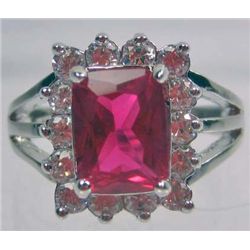 11314 - WHITE GOLD PLATED RUBY AND TOPAZ RING