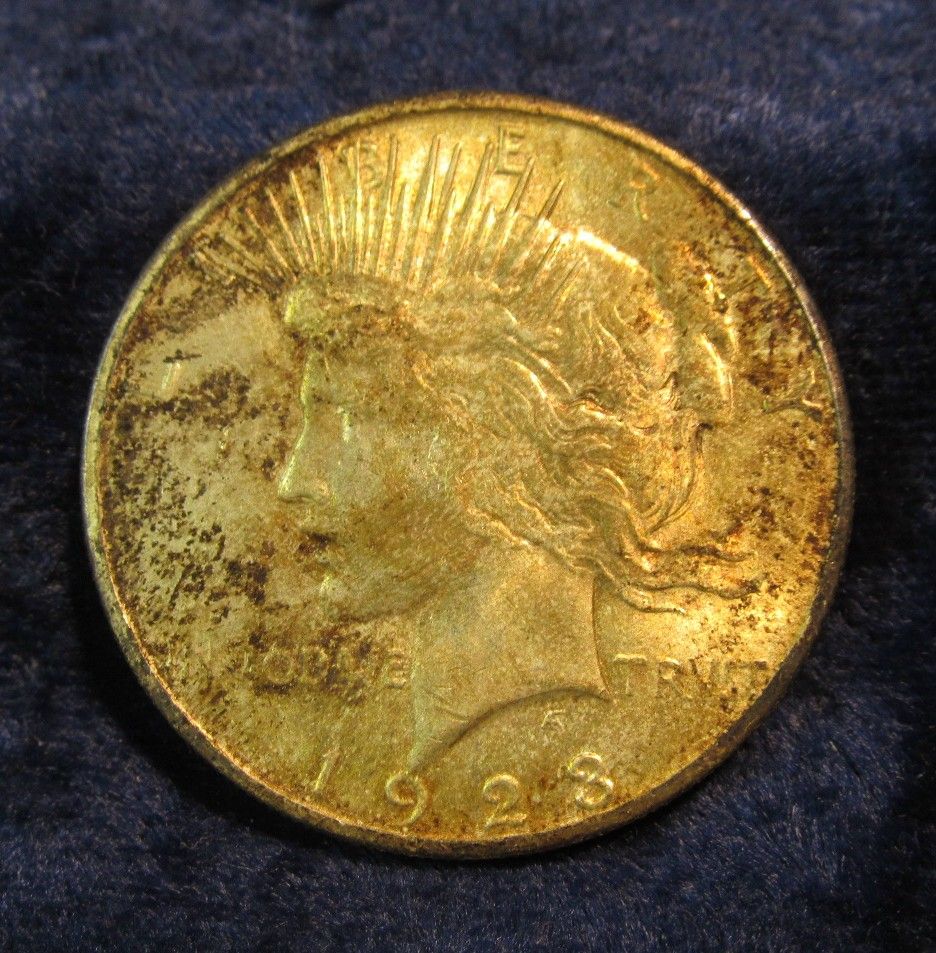 764. 1923 S Silver Dollar. Full dark toned Uncirculated. In a