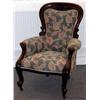 Image 1 : A Victorian carved mahogany framed upholstered spoon back armchair