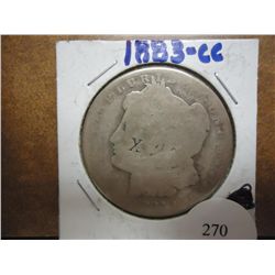 1883-CC MORGAN SILVER DOLLAR X ON CHEEK