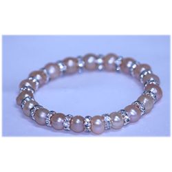 85.45 CTW PEACH PEARL AND CZ BRACELET