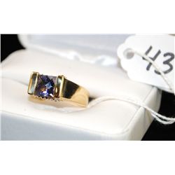WOMANS 18K YELLOW GOLD TANZANITE & DIAMOND  RING WITH ONE 7MM TANZANITE CENTER AND TWENTY  TWO DIAMO