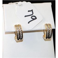 LADIES DIAMOND EARRINGS WITH EACH EARRING  HAVING 14 ROUND CHANNEL SET DIAMONDS SET IN  14K YELLOW G