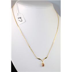 RUBY & DIAMOND 14K YELLOW GOLD NECKLACE WITH  ONE PEAR SHAPED RUBY CENTER GEMSTONE AND  SURROUNDED W