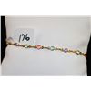 Image 1 : 22K YELLOW  GOLD MULTI-COLORED GEMSTONE  BRACELET - APPRAISED RETAIL REPLACEMENT IS  $1,200.00 - COM