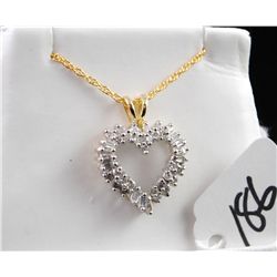 WOMENS DIAMOND HEART SHAPED PENDANT WITH  ROUND AND BAGUETTE DIAMONDS SET IN  10K   YELLOW GOLD PEND