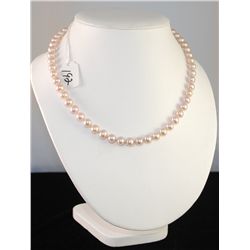 ELEGANT LADIES PEARL NECKLACE WITH FIFTY SIX  ROUND MATCHING 7 1/2 MM PEARLS - HAND KNOTTED  WITH 14