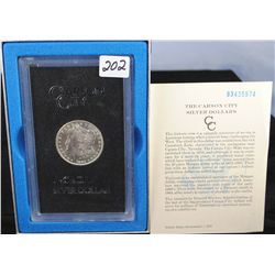 1883-CC GSA BLACK  BOX MORGAN DOLLAR WITH  ORIGINAL BOX AND  CERTIFICATE OF AUTHENTICITY