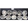 Image 1 : TEN SIVLER (90%) COMMEMORATIVE DOLLARS  INCLUDE VIETNAM VETERANS MEMORIAL, STATUE OF  LIBERTY, WE TH