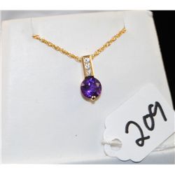 LADIES AMETHYST & DIAMOND PENDANT WITH ONE  ROUND AMETHYST CENTER GEMSTONE AND THREE  ROUND DIAMONDS