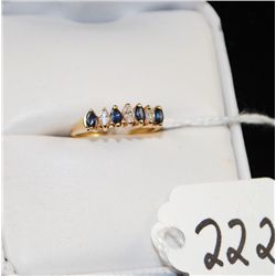 14K  YELLOW GOLD SAPPHIRE AND  DIAMOND RING  WITH FOUR MARQUISE CUT BLUE SAPPHIRES AND  THREE MARQUI