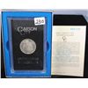 Image 1 : 1884-CC GSA BLACK BOX MORGAN DOLLAR WITH THE  ORIGINAL BOX AND CERTIFICATE OF AUTHENTICITY