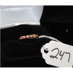 LADIES DIAMOND AND RUBY RING WITH FIVE  CHANNEL SET AND SIX CHANNEL SET RUBIES IN 14K  YELLOW GOLD R