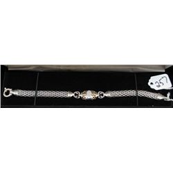 14K WHITE GOLD AND STERLING SILVER BRACELET  WITH THIRTEEN DIAMONDS