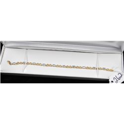 LADIES BLUE TOPAZ & DIAMOND  BRACELET WITH  TEN OVAL CUT BLUE TOPAZ AND ONE DIAMOND -  WEIGHS 4,5 GR