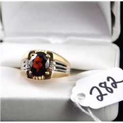 MANS GARNET AND DIAMOND RING WITH ONE OVAL  CUT GARNET CENTER GEMSTONE AND FOUR ACCENT  DIAMONDS - W