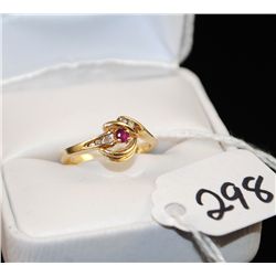 14K YELLOW GOLD RUBY AND DIAMOND RING WITH  ONE ROUND RUBY AND FIVE CHANNEL SET ACCENT  DIAMONDS - W