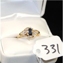 SAPPHIRE AND DIAMOND RING WITH ONE OVAL BLUE  SAPPHIRE AND SIX ACCENT DIAMONDS SET IN 10K  YELLOW GO