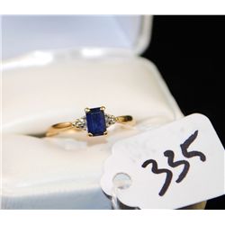 LADIES BLUE SAPPHIRE AND DIAMOND RING WITH  ONE LAB CREATED BLUE SAPPHIRE AND SIX ACCENT  DIAMONDS S