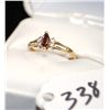 Image 1 : WOMANS GARNET AND DIAMOND RING WITH ONE  MARQUISE CUT GARNET CENTER GEMSTONE AND FOUR  ACCENT DIAMON