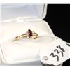 Image 2 : WOMANS GARNET AND DIAMOND RING WITH ONE  MARQUISE CUT GARNET CENTER GEMSTONE AND FOUR  ACCENT DIAMON