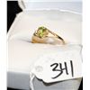 Image 1 : LADIES PERIDOT AND DIAMOND RING WITH ONE OVAL  PERIDOT CENTER GEMSTONE AND TWO ACCENT  DIAMONDS SET 