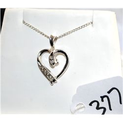 HEART SHAPED DIAMOND SILVER PENDANT WITH  SEVEN ROUND DIAMONDS - APPRAISED RETAIL  REPLACEMENT IS $2
