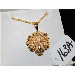 14K YELLOW GOLD LIONS HEAD PENDANT WITH DIAMOND EYES - WEIGHSN 6.2 GRAMS - APPRAISED RETAIL REPLACEM
