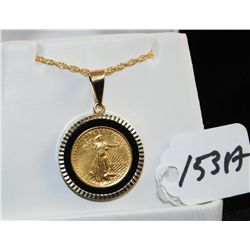 1990 1/10 .999 AMERICAN GOLD COIN SET IN 14K YELLOW GOLD AND ONYX BEZEL PENDANT