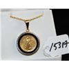 Image 1 : 1990 1/10 .999 AMERICAN GOLD COIN SET IN 14K YELLOW GOLD AND ONYX BEZEL PENDANT
