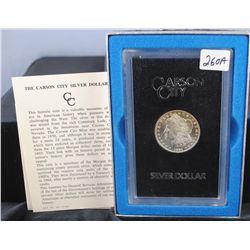 1884-CC GSA BLACK BOX MORGAN DOLLAR WITH ORIGINAL BOX AND CERTIFICATE OF AUTHENTICITY