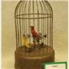 Image 1 : Victorian style automaton of feathered caged singing love birds £150 - 250...