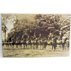 RPPC REAL PHOTO POSTCARD OF NATIVE AMERICAN INDIANS RIDING ON HORSEBACK