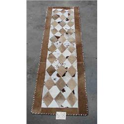 1 COWHIDE RUG-2' X 8.6"...