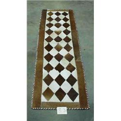 1 COWHIDE RUG-2' X 8.6"...