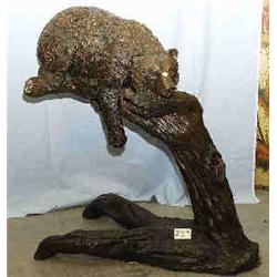 A 1 BRONZE BEAR ON TREE TRUNK 41"L....