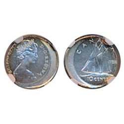 Ten Cents. 196?. NGC graded Silver. Struck 15% off center. Surface hairlines. Viewing recommended.