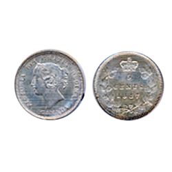 1887. Re-Punched ‘7’ variety. ICCS AU-50. Good strike. Light gray toning.