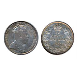 1902-H. PCGS graded Mint State-63. Light to medium heavy multi-hued toning.